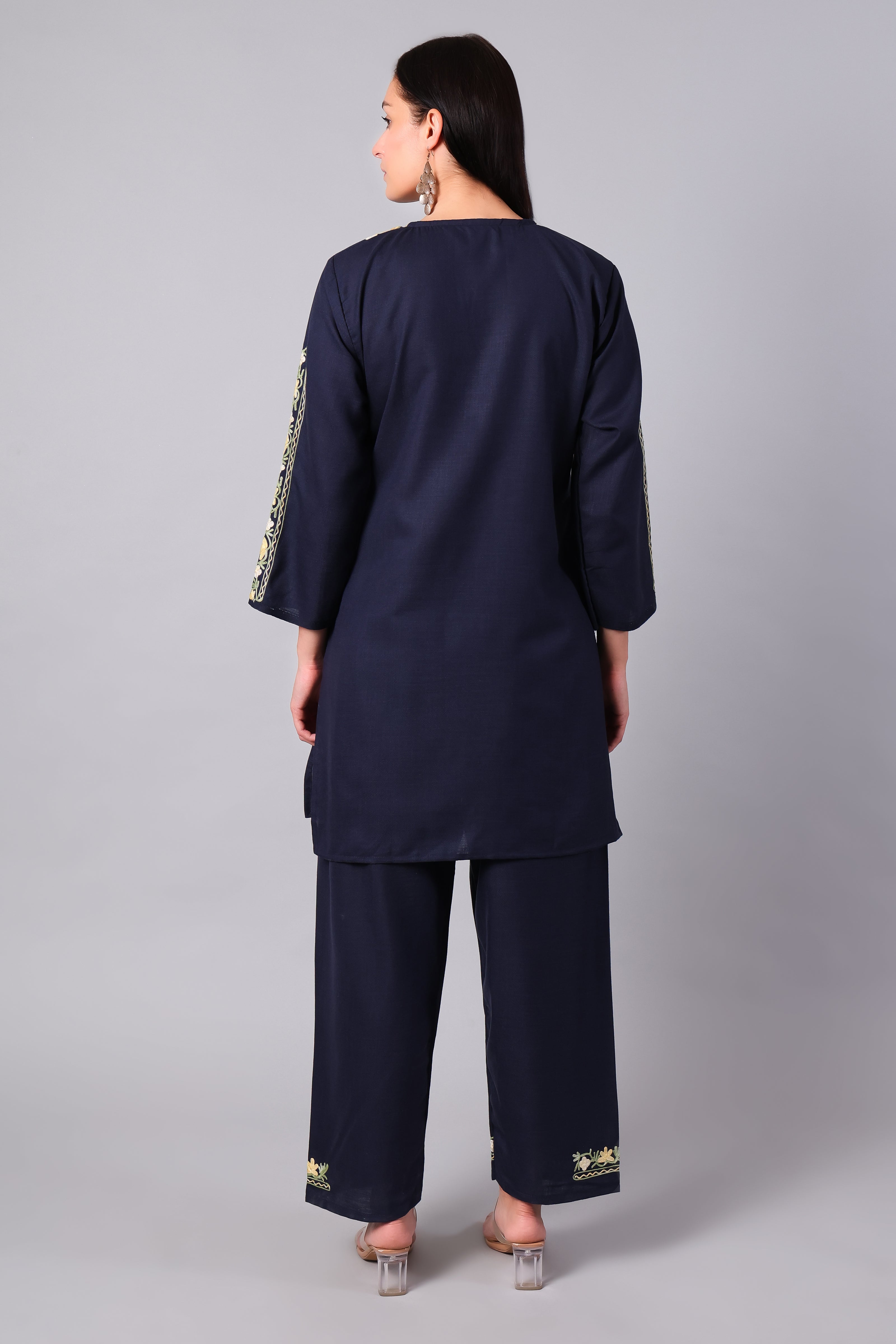 Woman wearing a navy blue traditional Cotton Summer Cord set with Aari embroidery- back