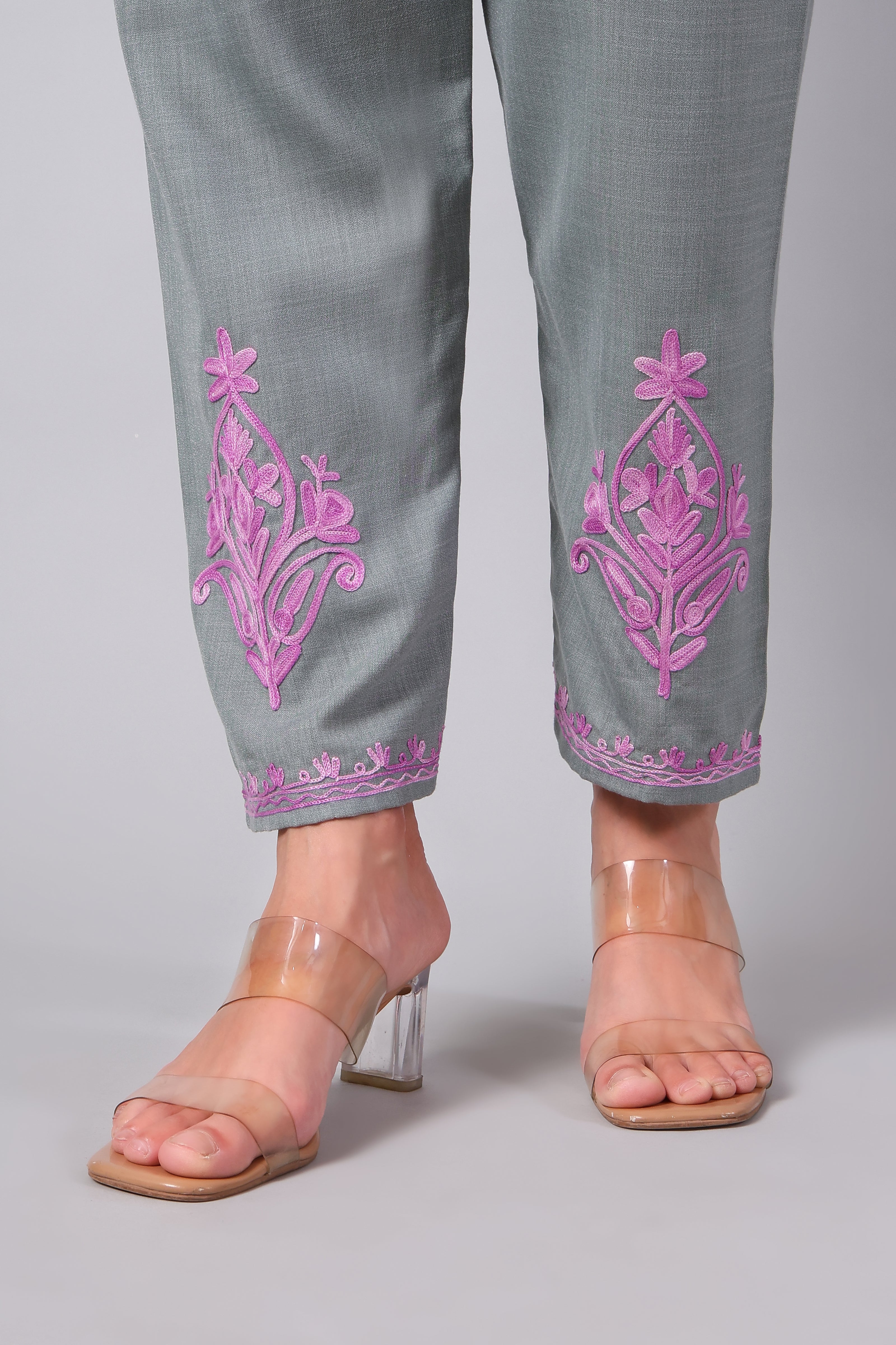 Detailed view of pink Aari embroidery on grey co-ord set pants