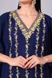 Close-up of multicolour vine Kashmiri Aari embroidery on midnight blue kaftan neckline