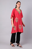 Coral red kaftan for women side view with loose fit and embroidery

