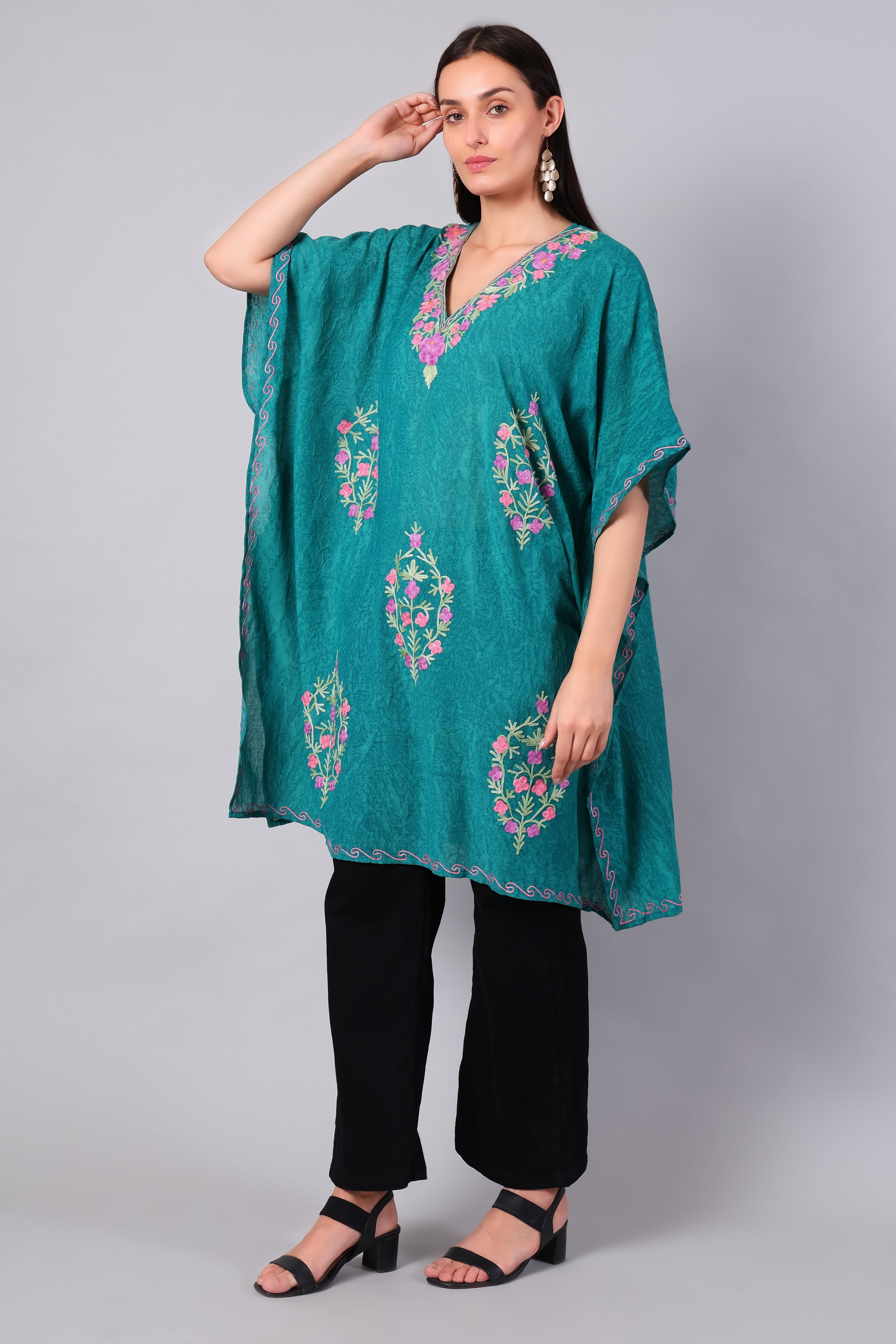 Novbahar teal green Kashmiri kaftan — front angle with floral embroidery detail